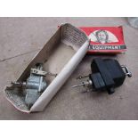 A boxed Trico wiper motor and another