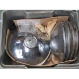 A box of chromed hub caps - new old stock