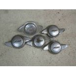 Five vintage Jaguar wheel caps