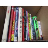 A box of books including "Clarkson Driven to Distraction" etc