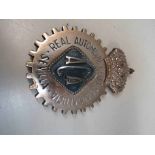 A cast alloy 'Real Automovil Club De Andalucia-Sevilla' badge stamped 4354 to verso