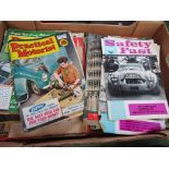 A box of mixed magazines including 'Practical Motorist',