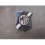 An enamelled MG car club badge