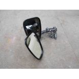 A pair of chromed motorcycle mirrors