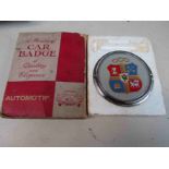 A chrome and enamelled Automotif badge in original box