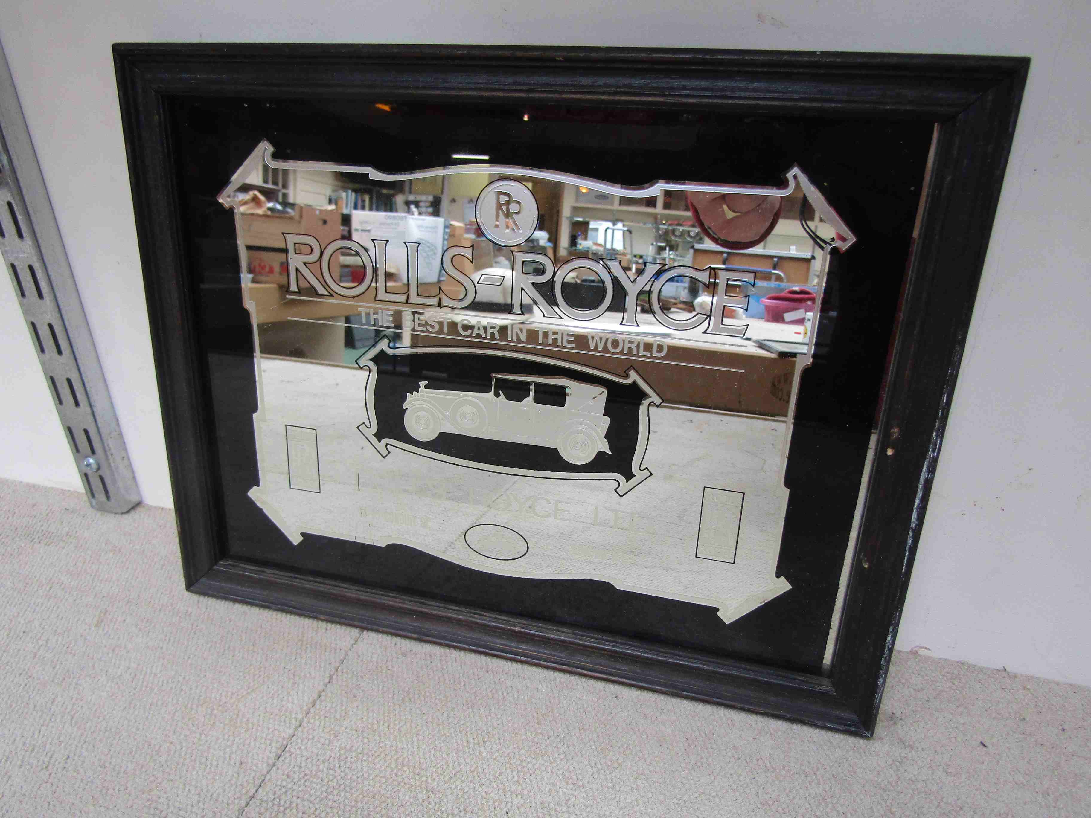 A framed Rolls Royce mirror "The Best Car in the World"