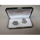 A cased pair of silver Aston Martin cuff links.