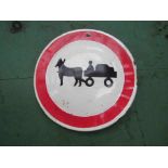 A circular enamelled horse and cart road sign,