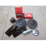 A box containing Mini items including rear view mirrors,