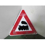 An enamelled triangular road sign 'Train Warning' 57cm x 63cm