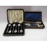 A set of six William Suckling silver coffee spoons, Birmingham 1935 and 1920's era souvenir spoons,