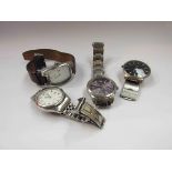 Four gentleman's wristwatches including "DKNY" and "Sekonda" etc