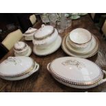 A quantity of Cauldon china white/gilt ground dinnerwares