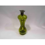 A Victorian Art Nouveau green glass decanter,