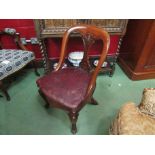 A mahogany spoon back chair with leather seat on cabriole legs