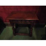 A Titchmarsh & Goodwin 17th Century style carved oak joint stool on baluster turned legs joined by