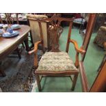 A set of 8 (6+2 carvers) Georgian style oak dining chairs with horse racing upholstered seats