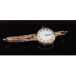 A 15ct gold cased lady's wristwatch, on 9ct gold strap, 22.