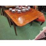 A 19th Century mahogany and rosewood Pembroke table with end drawer on square tapering legs,