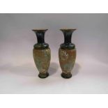 A pair of Doulton Slaters patent baluster vases, one repaired,