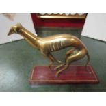 A Deco style brass figure of a whippet