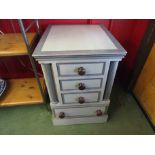 A painted four drawer bed side chest,