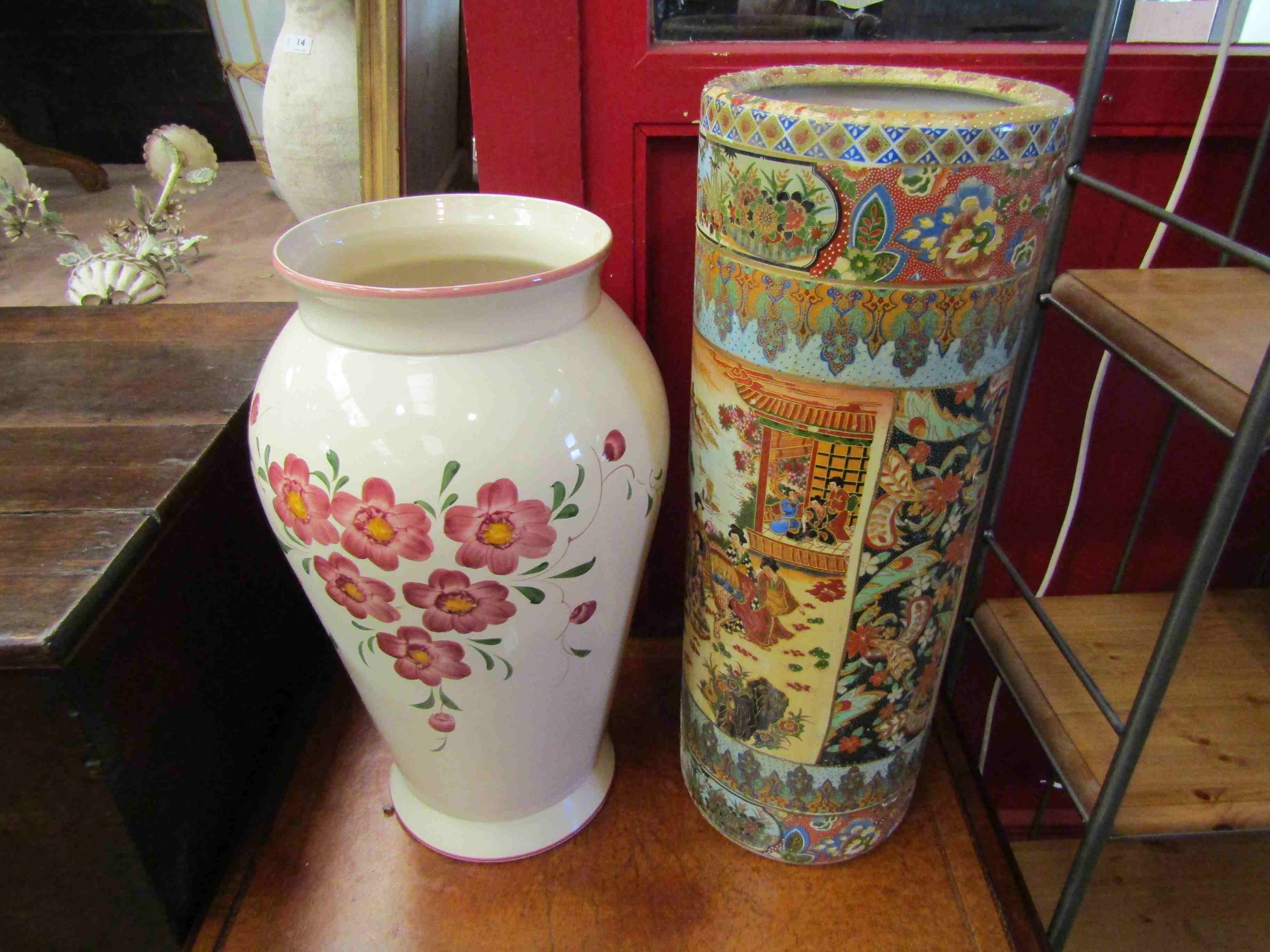 Two stick stands including cylindrical Oriental design example