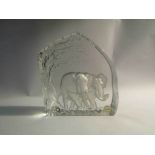 A Goebel crystal glass paperweight depicting two elephants