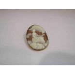 An oval cameo brooch depicting Hebe feeding the eagles, 5cm x 3.