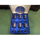 A cased set of six silver plate goblets and a plated dish