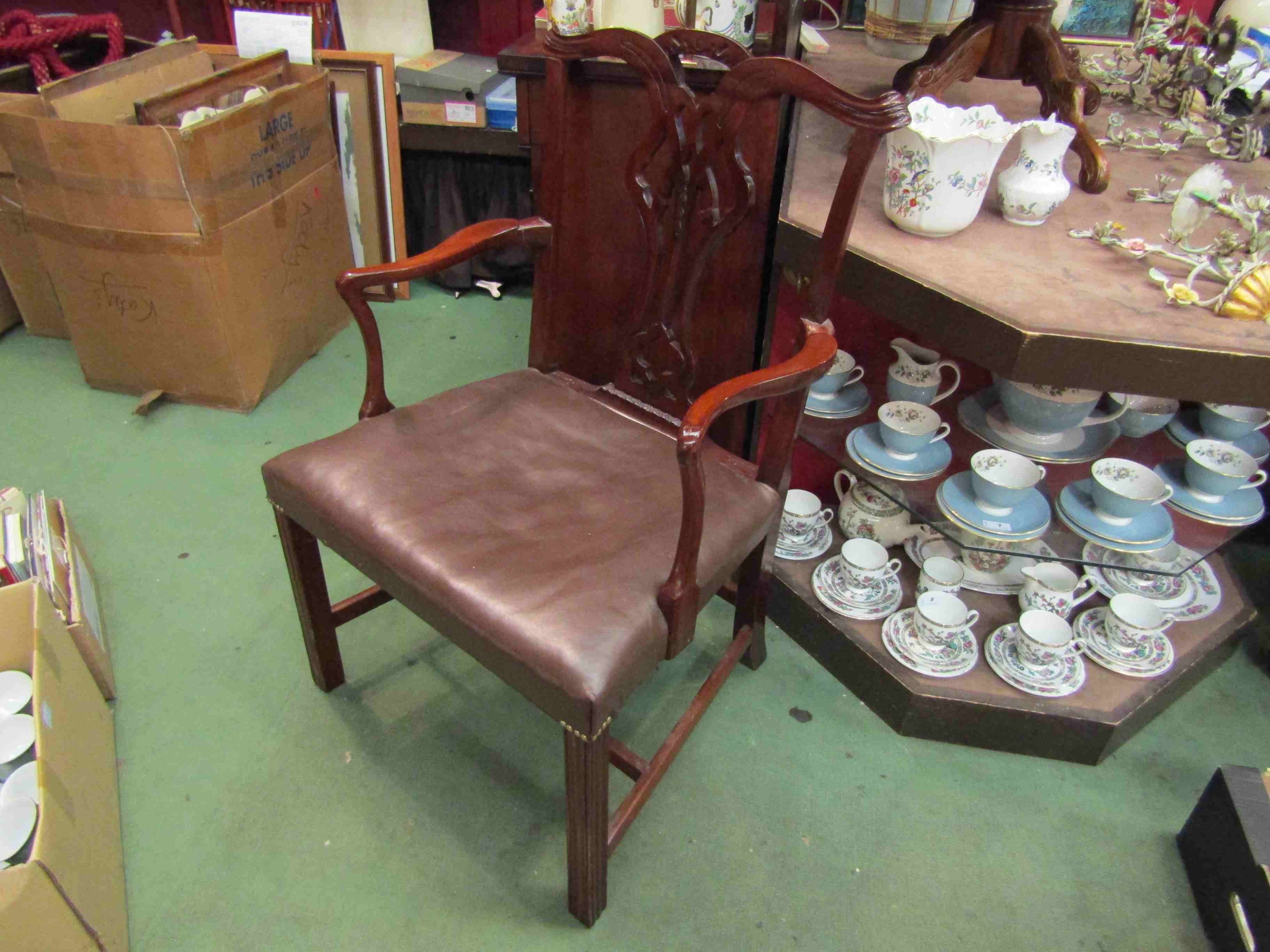 A 1930's Chippendale revival mahogany carver chair,
