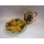 A Sylvac jug and matching bowl with fruit design