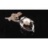 A white gold pendant/brooch set with single pearl, 8mm, unmarked 3.5cm drop, hung on chain, 5.