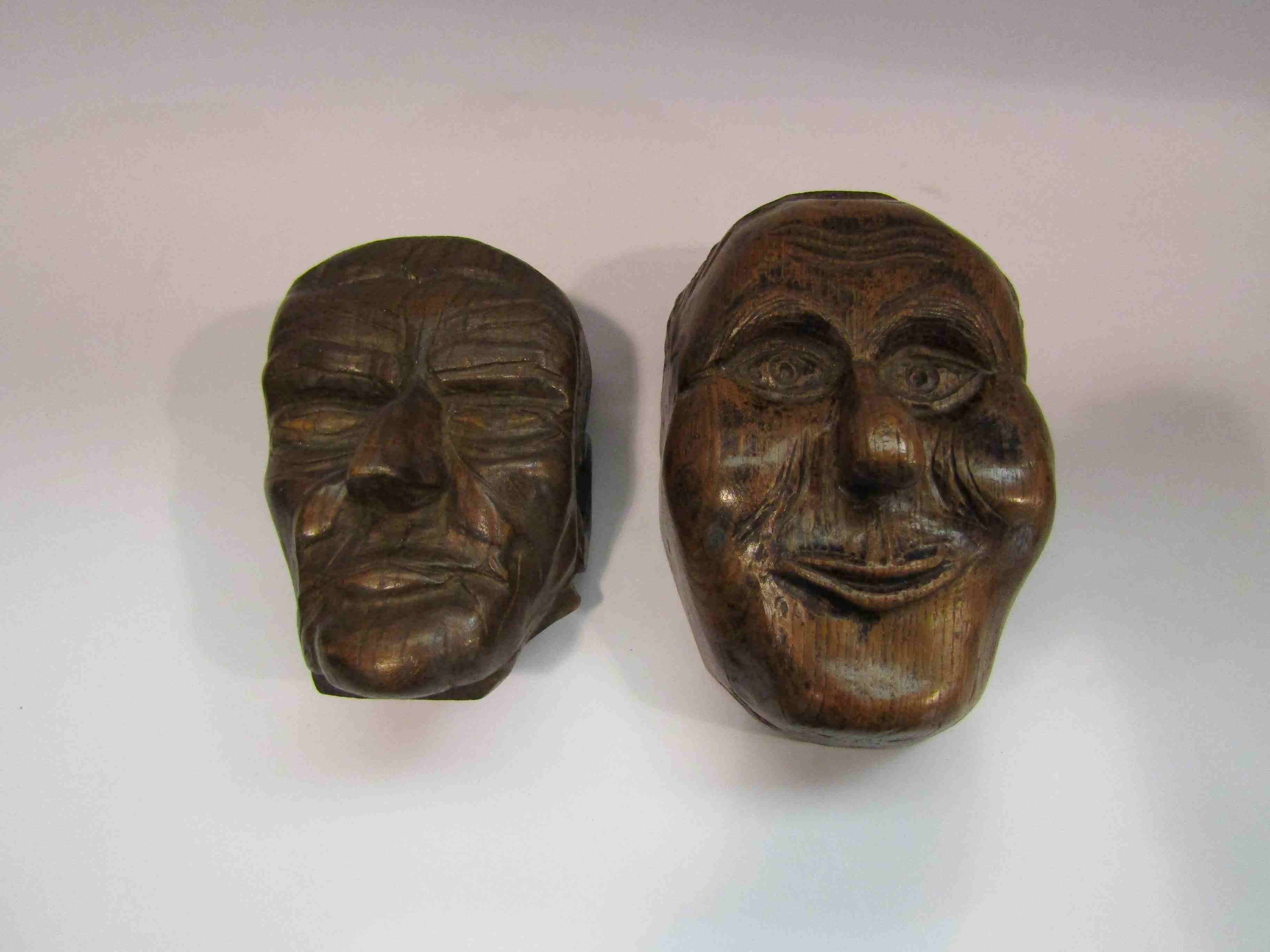Two treen heads