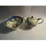 A modern Meissen porcelain teapot and a 19th Century English porcelain slop bowl,