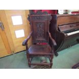 A 19th Century wainscot style carved oak chair,