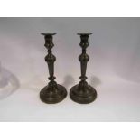 A pair of late 18th Century candlesticks,