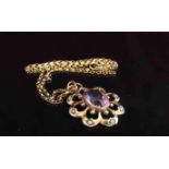 An Edwardian gold seed pearl and amethyst pendant stamped 9ct hung on 9ct gold chain, 46cm long, 4.