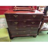 A George III mahogany chest of two short over three graduating long drawers on bracket feet,