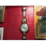 A rosewood banjo barometer,