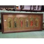 A set of six arch framed religious figures,