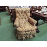 A Victorian Howard and Sons armchair,