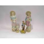 Four Continental ceramic figures including girl with watering can