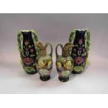 A pair of Moorcroft style vases with twin handles,