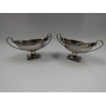 Two silver boat form salts