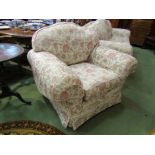 A Multiyork armchair with floral upholstery