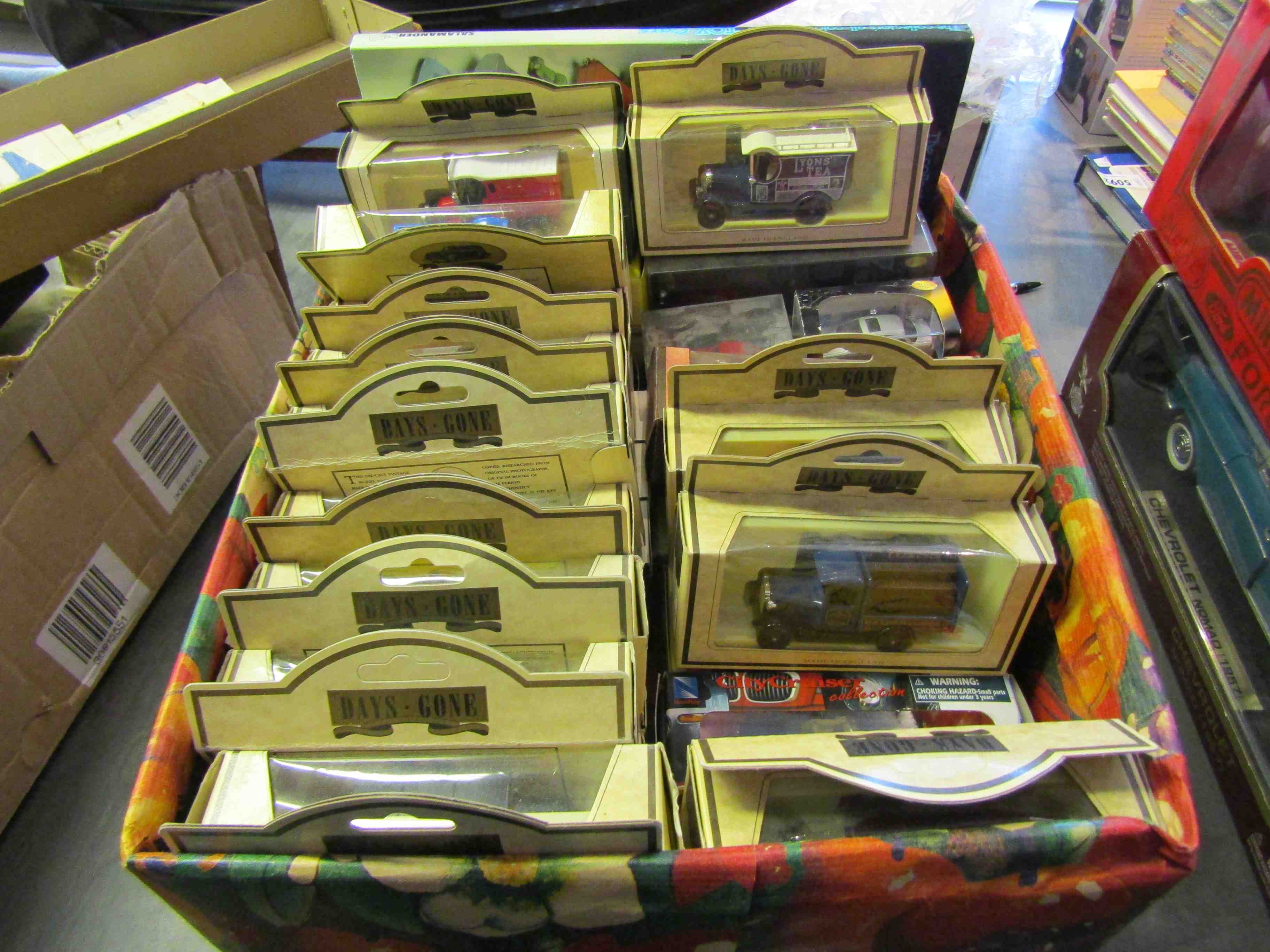 Assorted boxed diecast cars including Matchbox Models of Yesteryear,