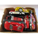 A collection of Burago 1:18 and 1:24 scale diecast cars and a Polistil 1:16 scale diecast car (11)