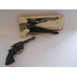 A boxed Replicast Streamline 100 shot repeating cap pistol and an unboxed Dyal example (2)