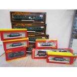 Four boxed Mainline 00 gauge coaches and sixed boxed Hornby items of rolling stock (9)